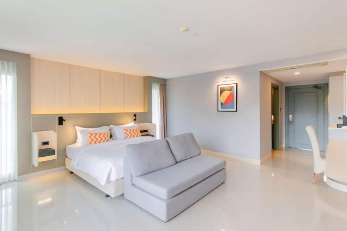 Free minibar items, in-room safe, desk, laptop workspace