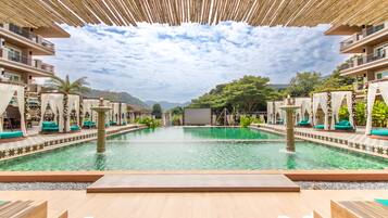 Outdoor pool, open 8:00 AM to 8:00 PM, free cabanas, pool umbrellas