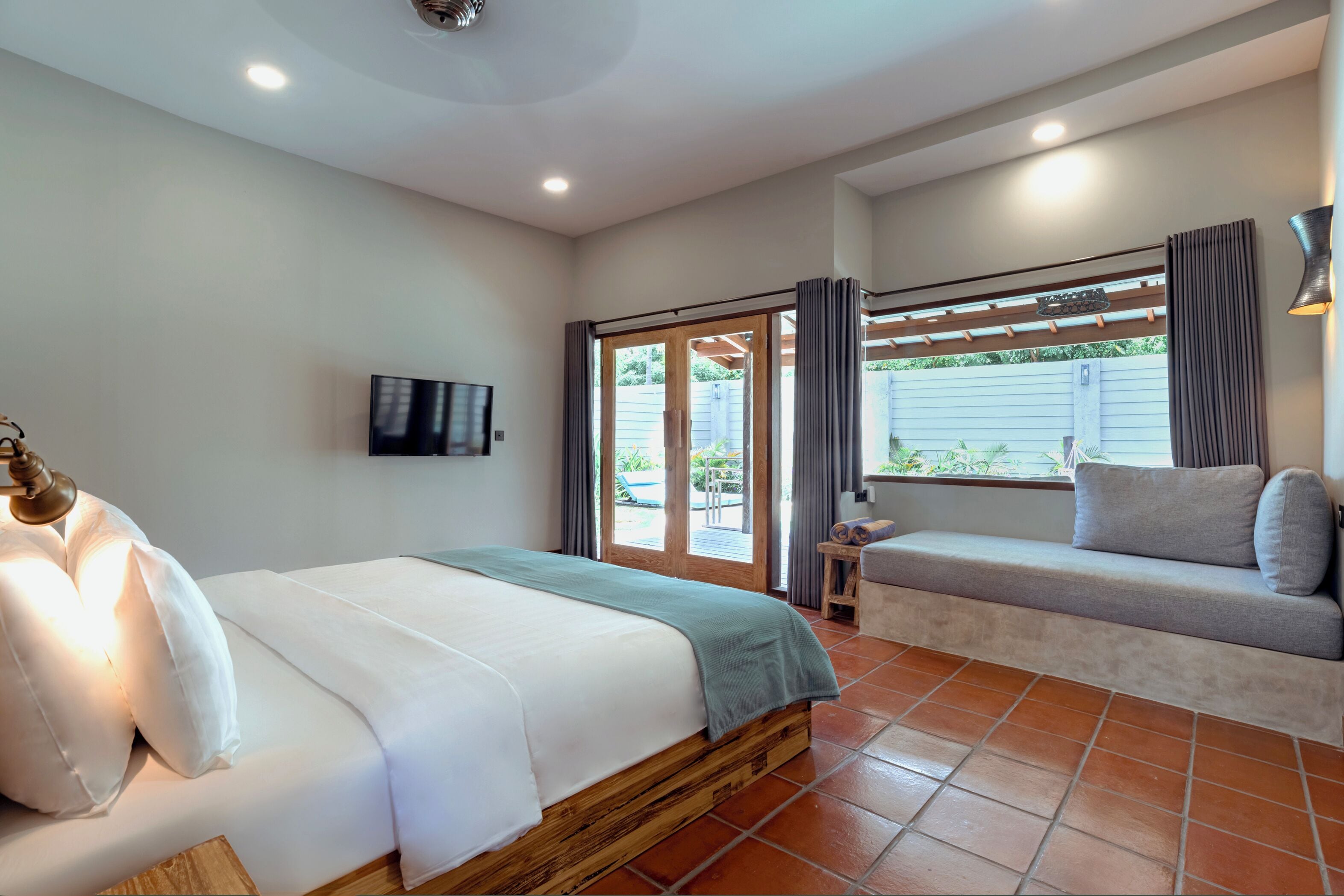 luxury one bedroom villa | minibar, in-room safe, desk, laptop workspace