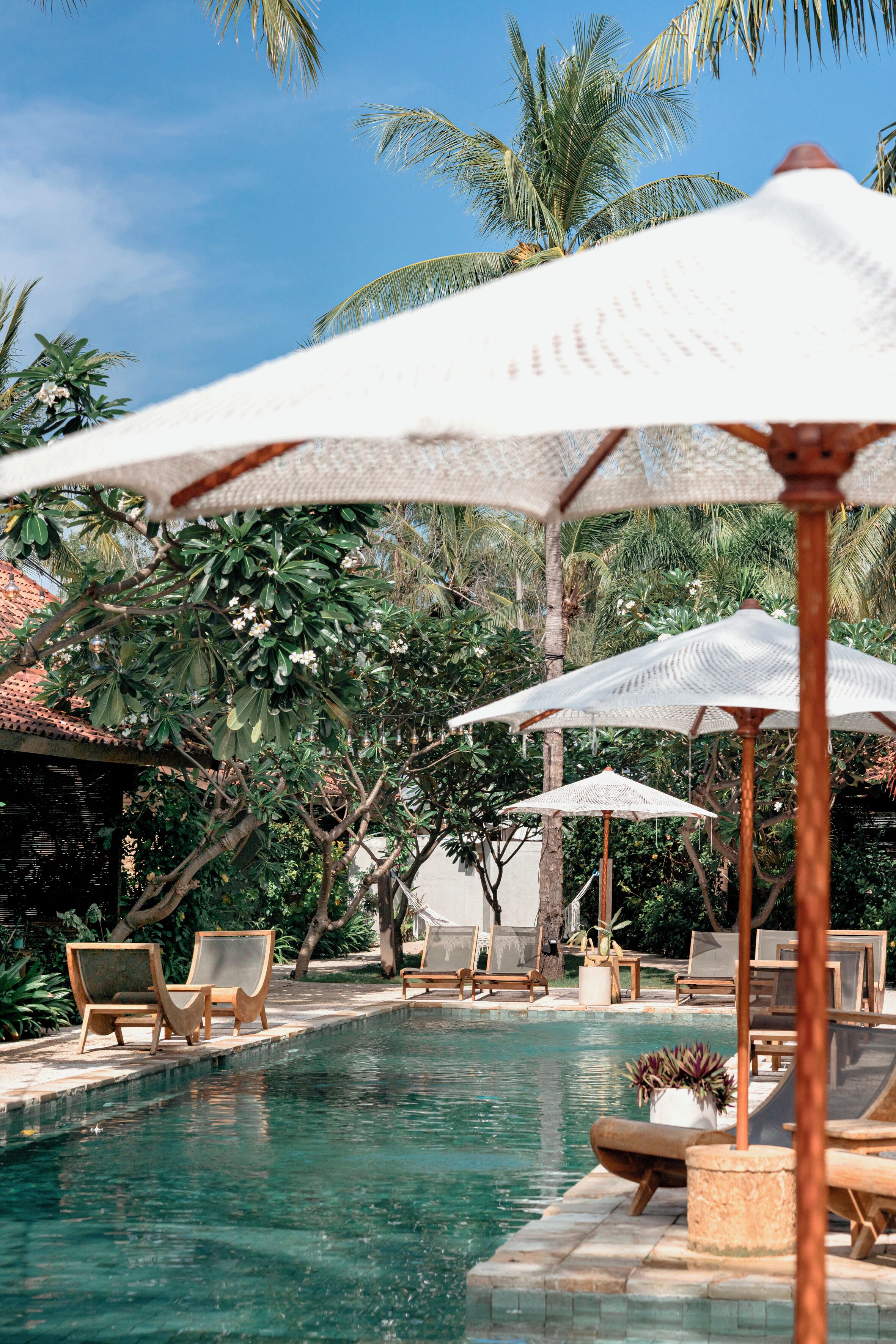 outdoor pool, pool umbrellas, pool loungers