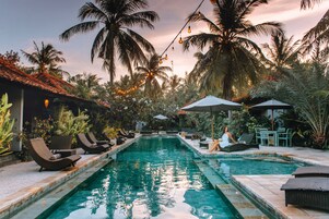 Outdoor pool, pool umbrellas, sun loungers