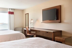 Premium bedding, down duvets, pillow-top beds, in-room safe