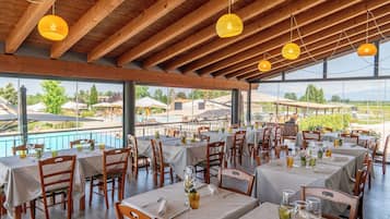 Dinner served, Italian cuisine, pool views