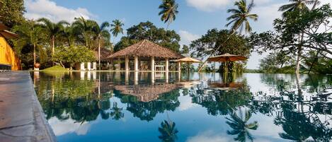 Outdoor pool, pool umbrellas, sun loungers