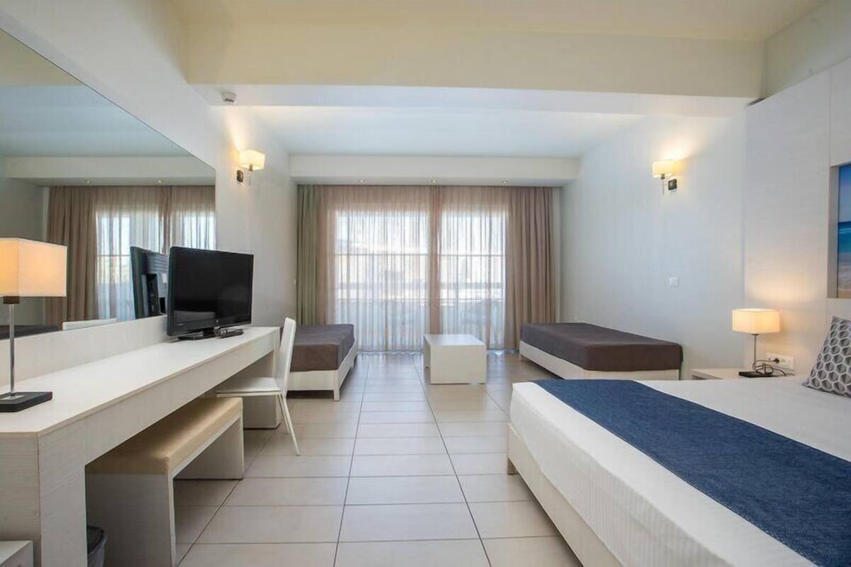 Junior Suite, Pool View | Desk, laptop workspace, WiFi (free), individually decorated
