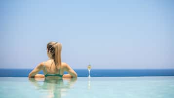 2 outdoor pools, pool umbrellas, sun loungers