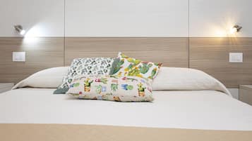 Premium bedding, down comforters, in-room safe, individually decorated