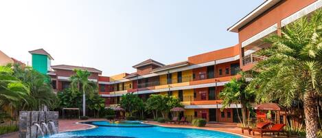 2 outdoor pools, open 7:00 AM to 8:00 PM, pool loungers