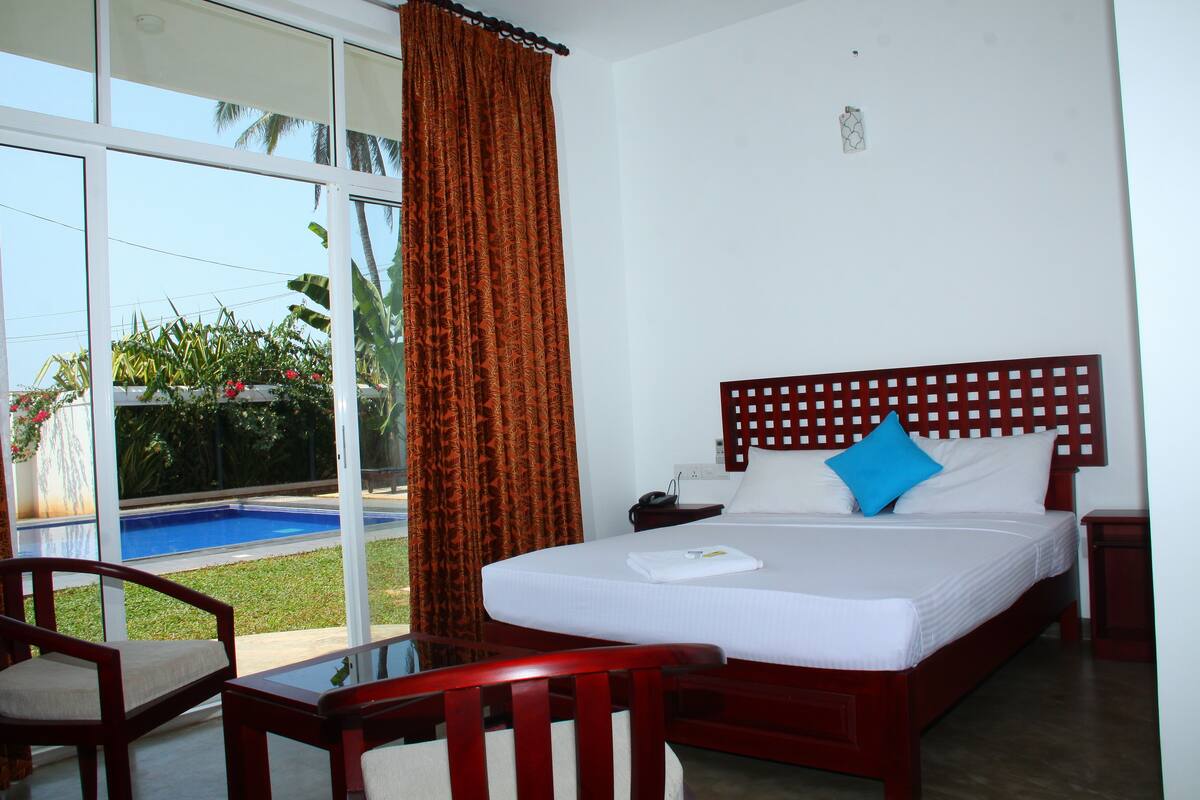 Deluxe tweepersoonskamer, 1 tweepersoonsbed, uitzicht op oceaan | Kameruitzicht