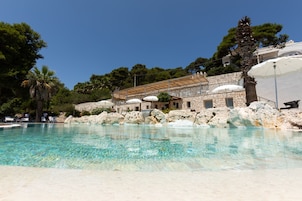 Outdoor pool, open 10:30 AM to 7:00 PM, pool umbrellas, sun loungers