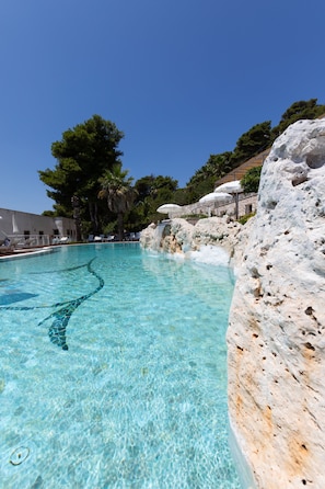 Outdoor pool, open 10:30 AM to 7:00 PM, pool umbrellas, pool loungers