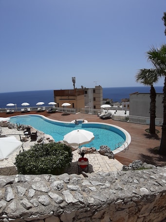 Outdoor pool, open 10:30 AM to 7:00 PM, pool umbrellas, sun loungers