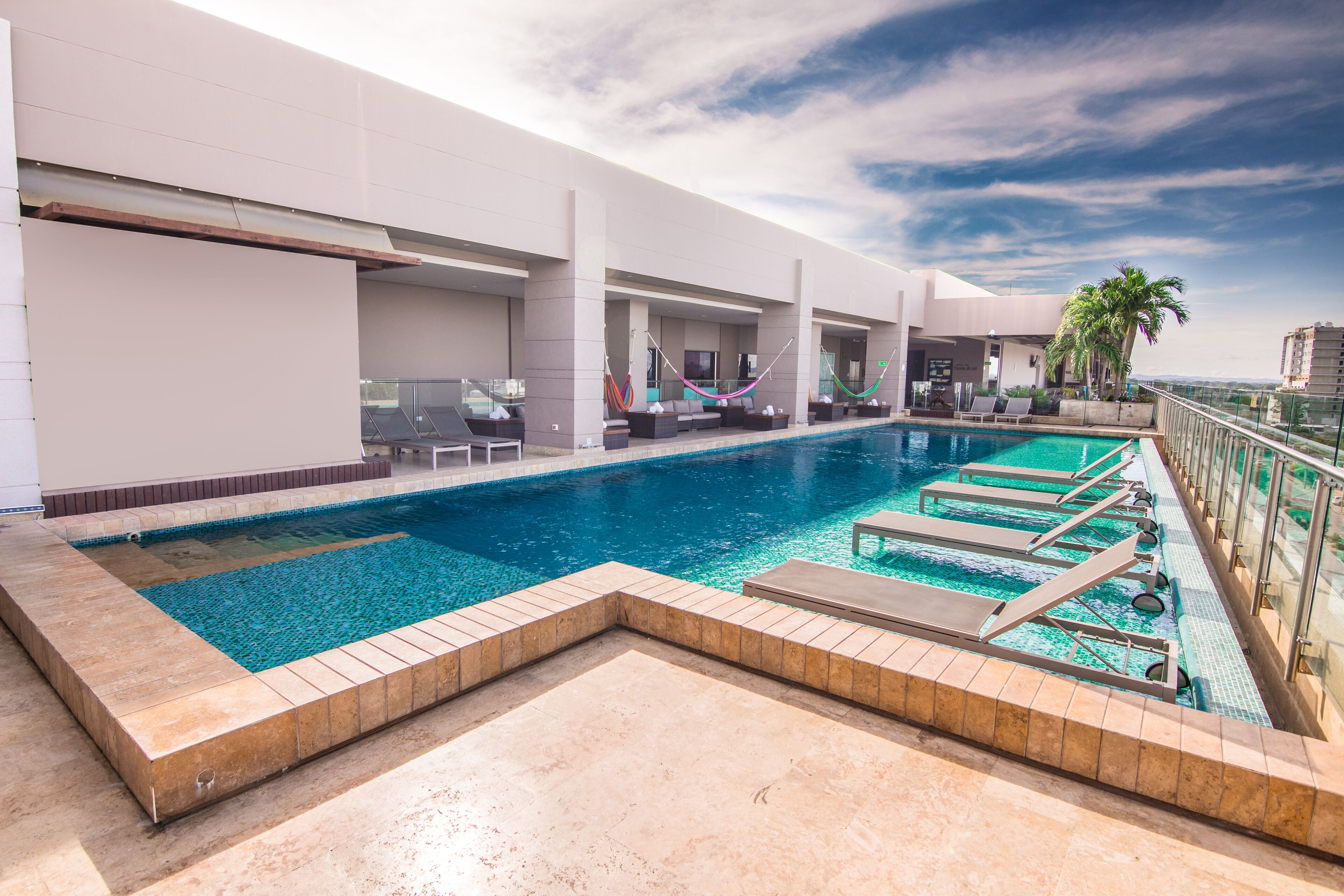 outdoor pool, open 9:00 am to 7:30 pm, pool loungers