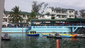 A water-based activity area at Subiza Beach Resort with inflatable rafts and jet skis. - Subiza Beach Resort (Olongapo)