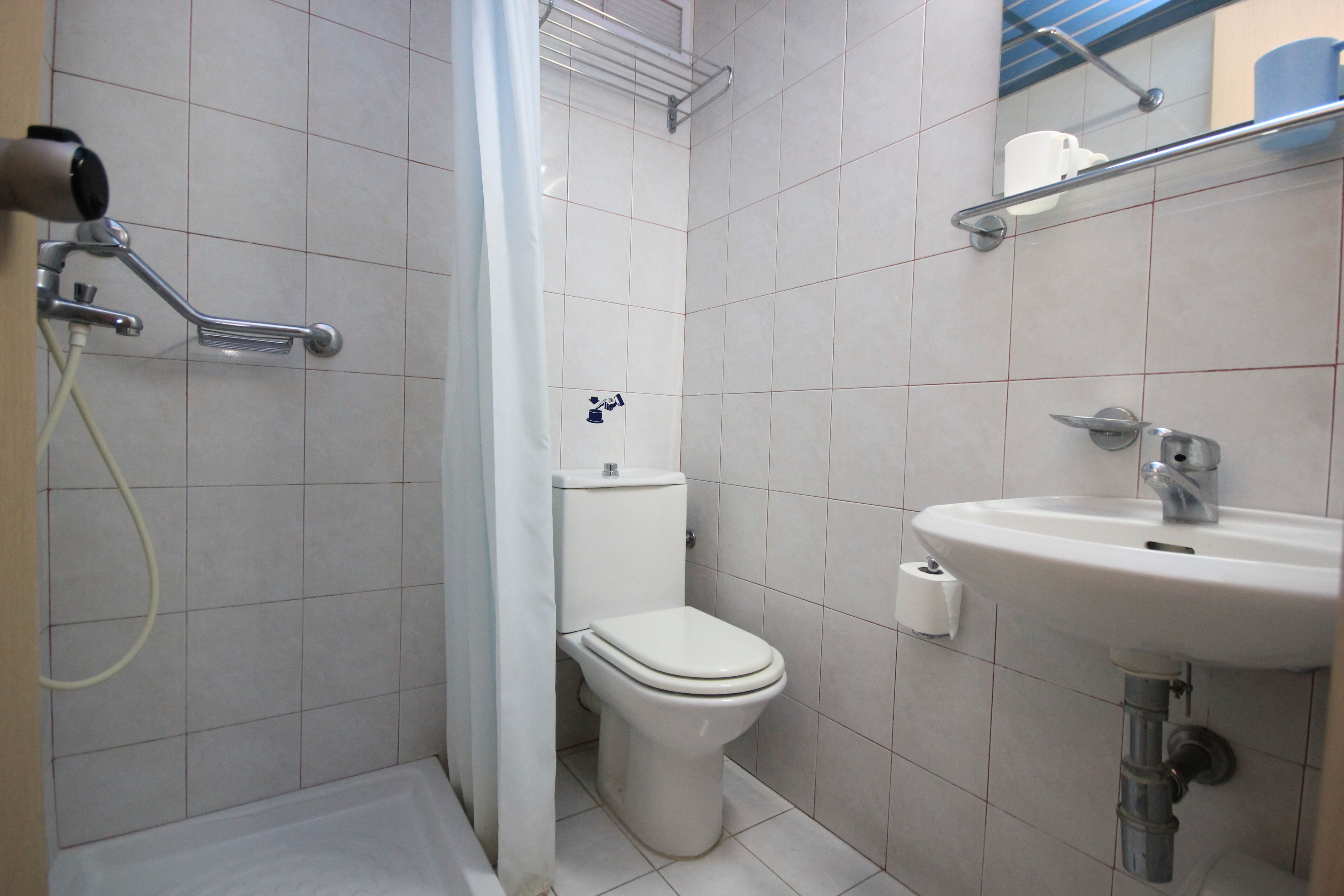 family room | bathroom | shower, hair dryer, towels