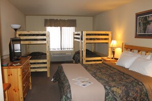 Desk, iron/ironing board, travel cot, rollaway beds