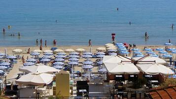 Private beach nearby, white sand, sun loungers, beach umbrellas