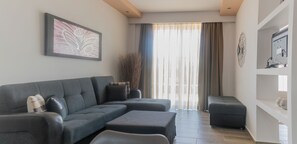 Familie-studiosuite, balkong | Blendingsgardiner, lydisolert og barnesenger (inkludert)