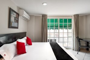 Standard Room | Down comforters, minibar, in-room safe, iron/ironing board