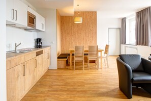 Superior Apartment, 2 Bedrooms | Private kitchen | Full-size fridge, microwave, stovetop, dishwasher