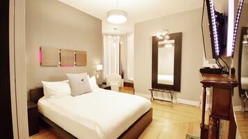 Suite Deluxe, 1 cama Queen size, patio | 1 habitación, tabla de planchar con plancha y wifi gratis