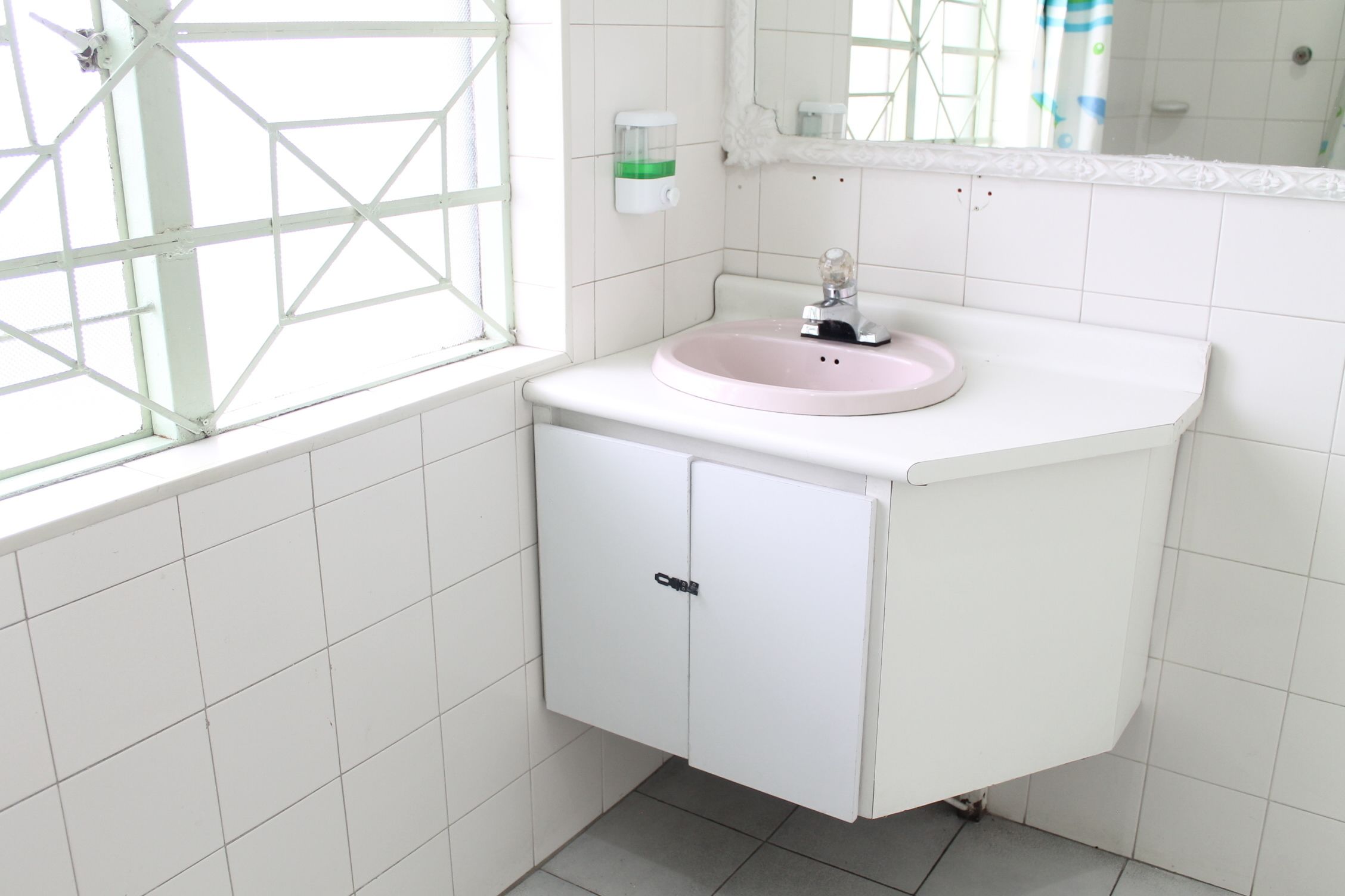 basic quadruple room, mixed dorm, shared bathroom | bathroom | shower, free toiletries, hair dryer, towels