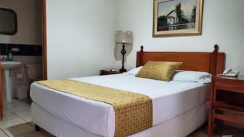 Minibar, desk, laptop workspace, iron/ironing board