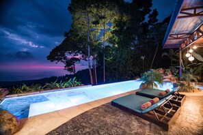 Outdoor pool, an infinity pool, free pool cabanas, pool loungers