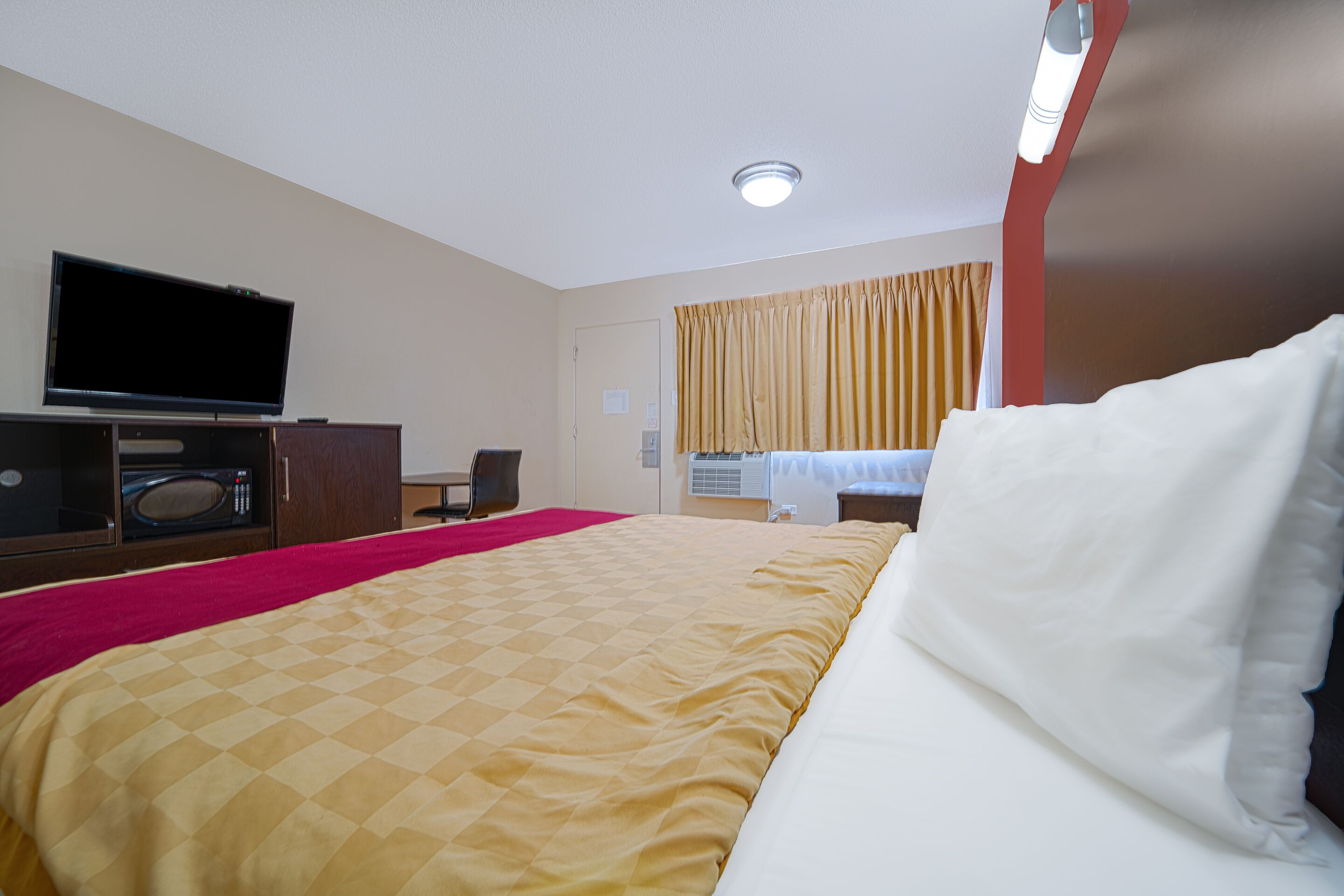 Room, 1 King Bed, Non Smoking | Desk, iron/ironing board, WiFi (free), bed sheets