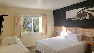 Comfort Quadruple Room | Minibar, in-room safe, desk, blackout curtains