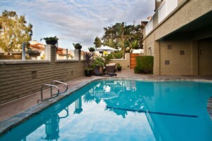 Outdoor pool, open 9:00 AM to 9:00 PM, pool umbrellas, sun loungers