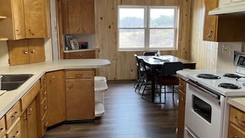 Cabin, 2 Bedrooms, Resort View | Private kitchen | Fridge, microwave, oven, stovetop