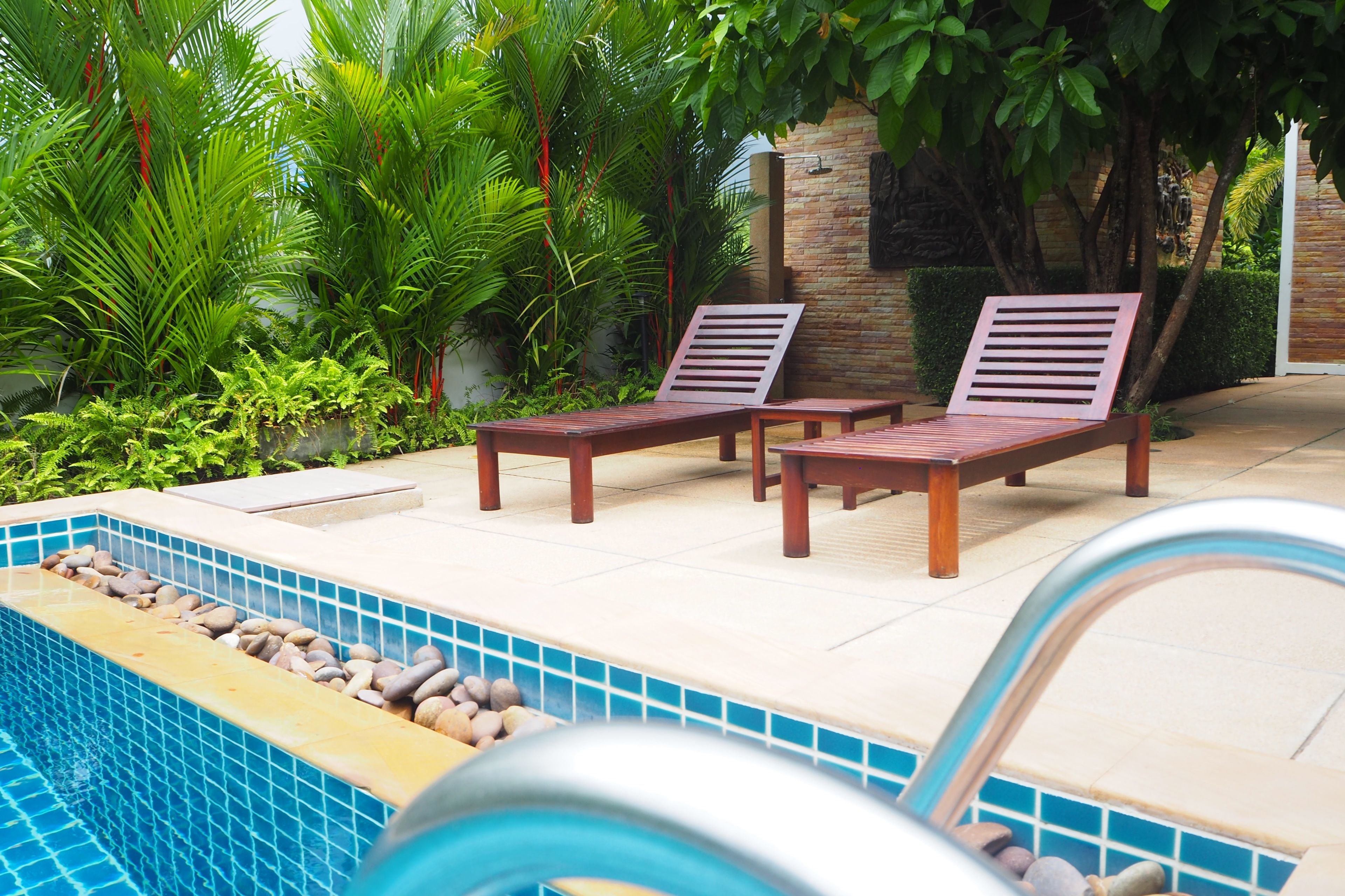 outdoor pool, pool loungers