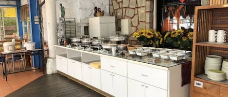 Free daily self-serve breakfast