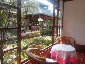Relax amidst lush greenery and tranquil surroundings in our serene garden oasis.