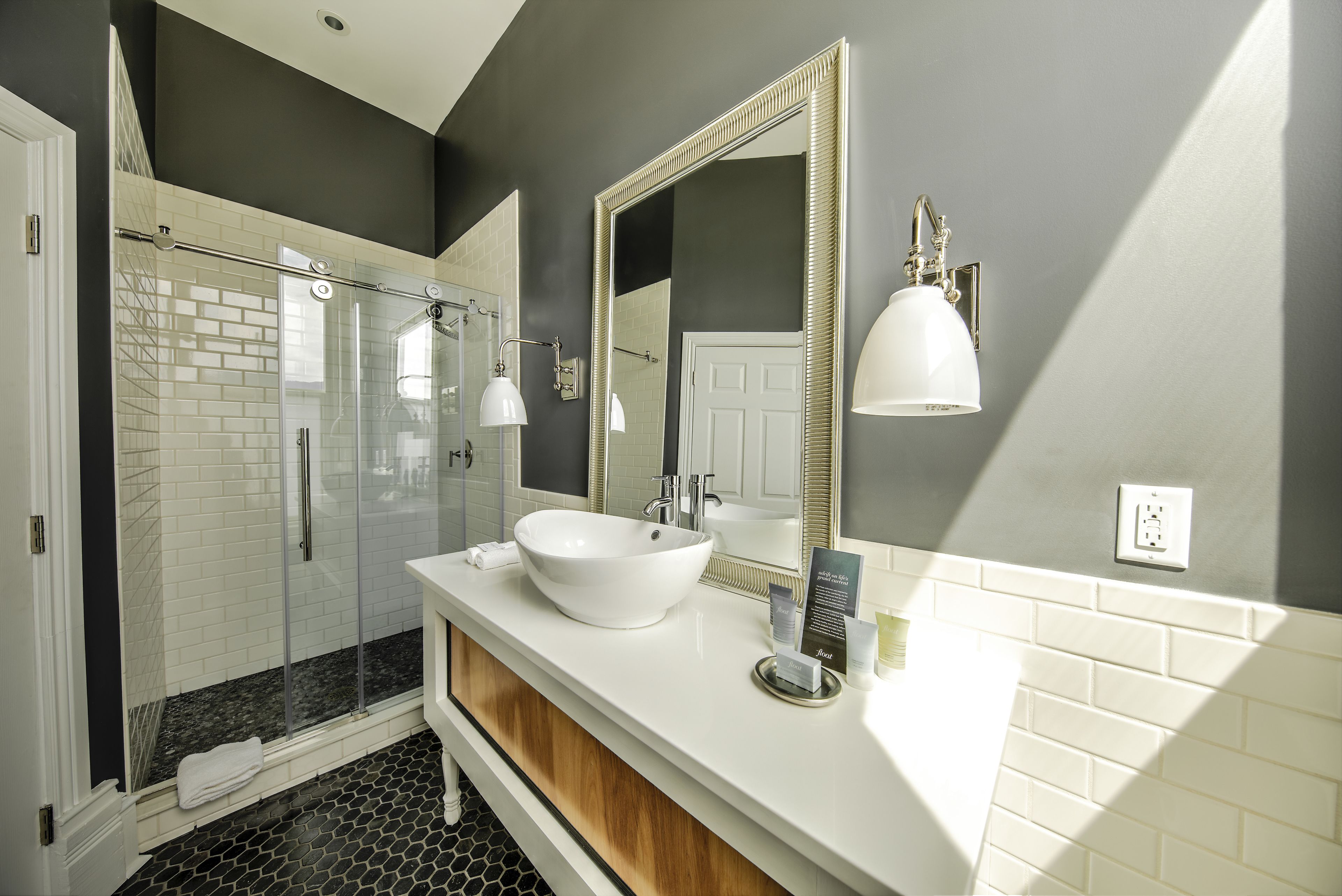 room (the ebony) | bathroom | rainfall showerhead, free toiletries, hair dryer, towels