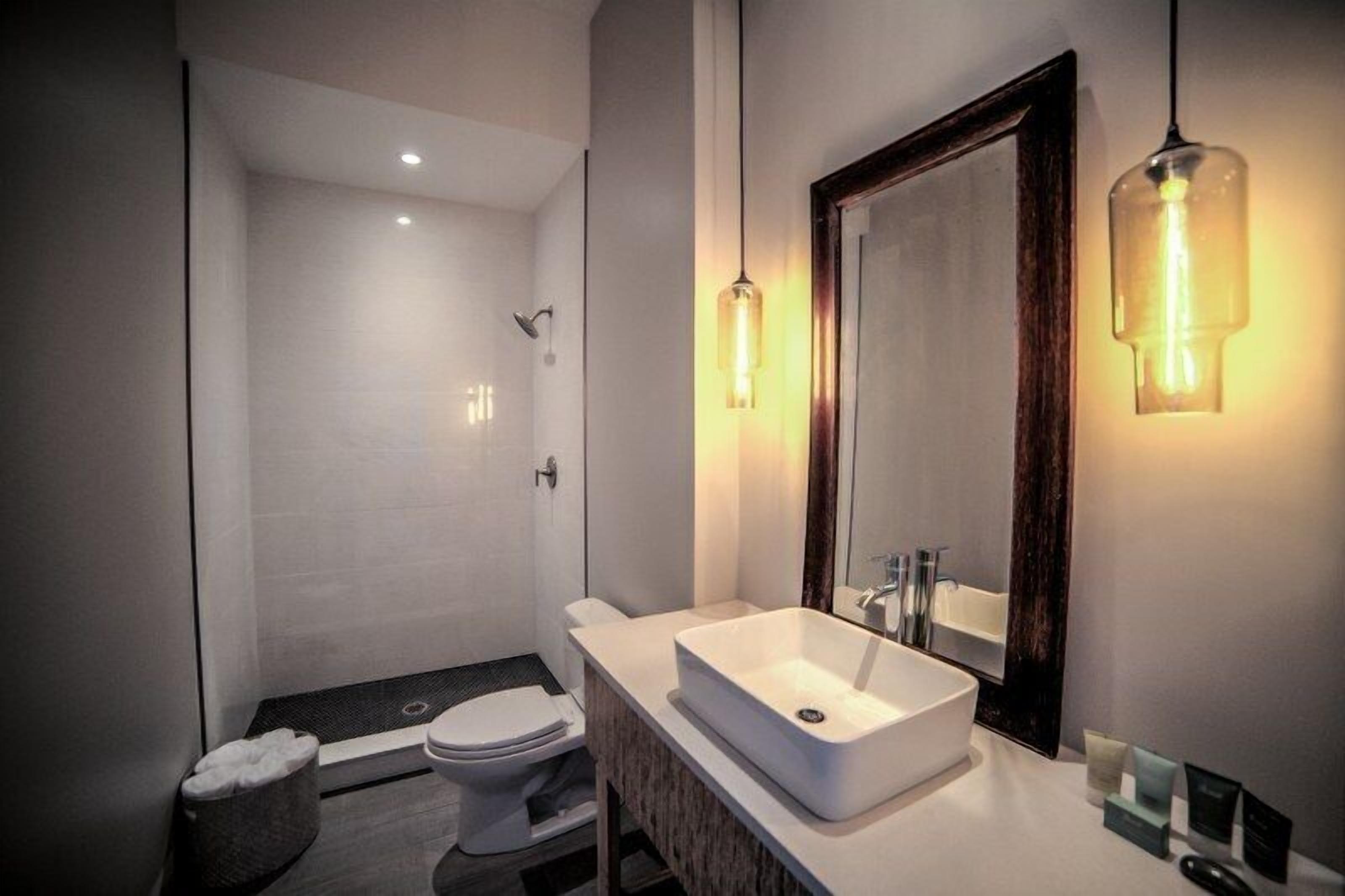 room (the copper suite) | bathroom | rainfall showerhead, free toiletries, hair dryer, towels