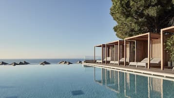 2 outdoor pools, pool umbrellas, pool loungers
