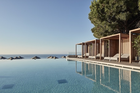 2 outdoor pools, pool umbrellas, sun loungers. Esperos Village Blue & Spa - Adults only