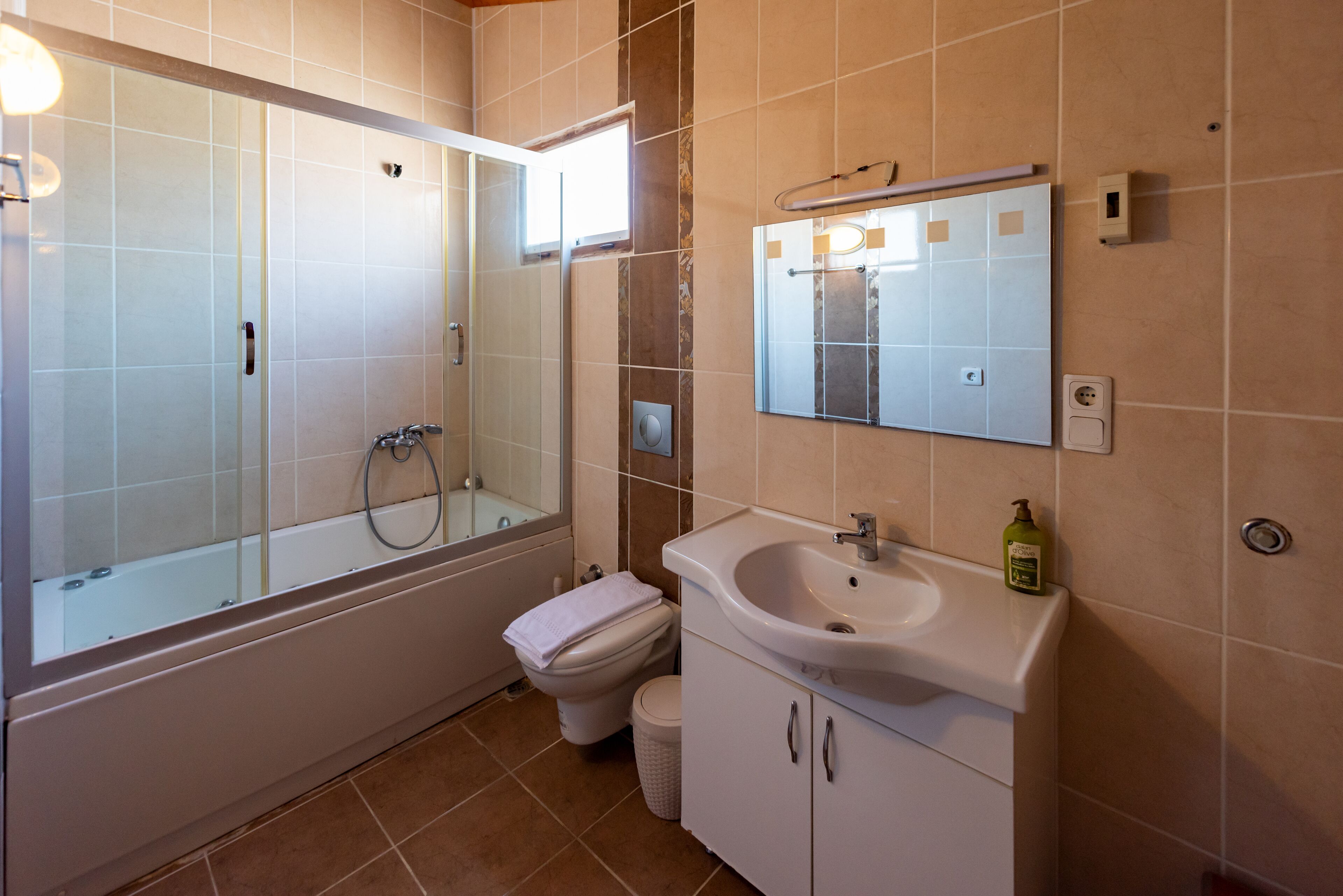 comfort penthouse | bathroom | shower, hair dryer, slippers, towels