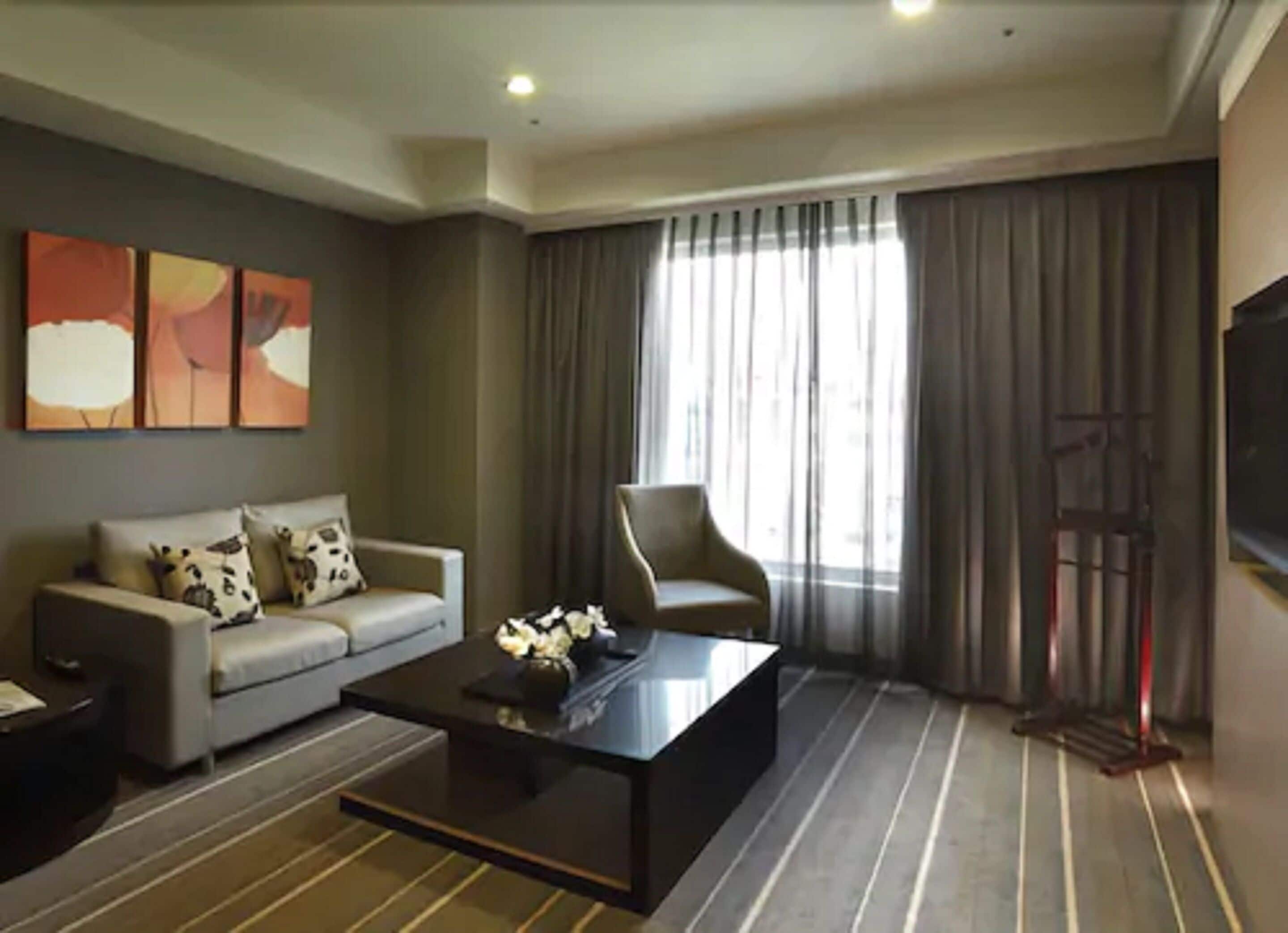 chic section superior suite | living area | led tv