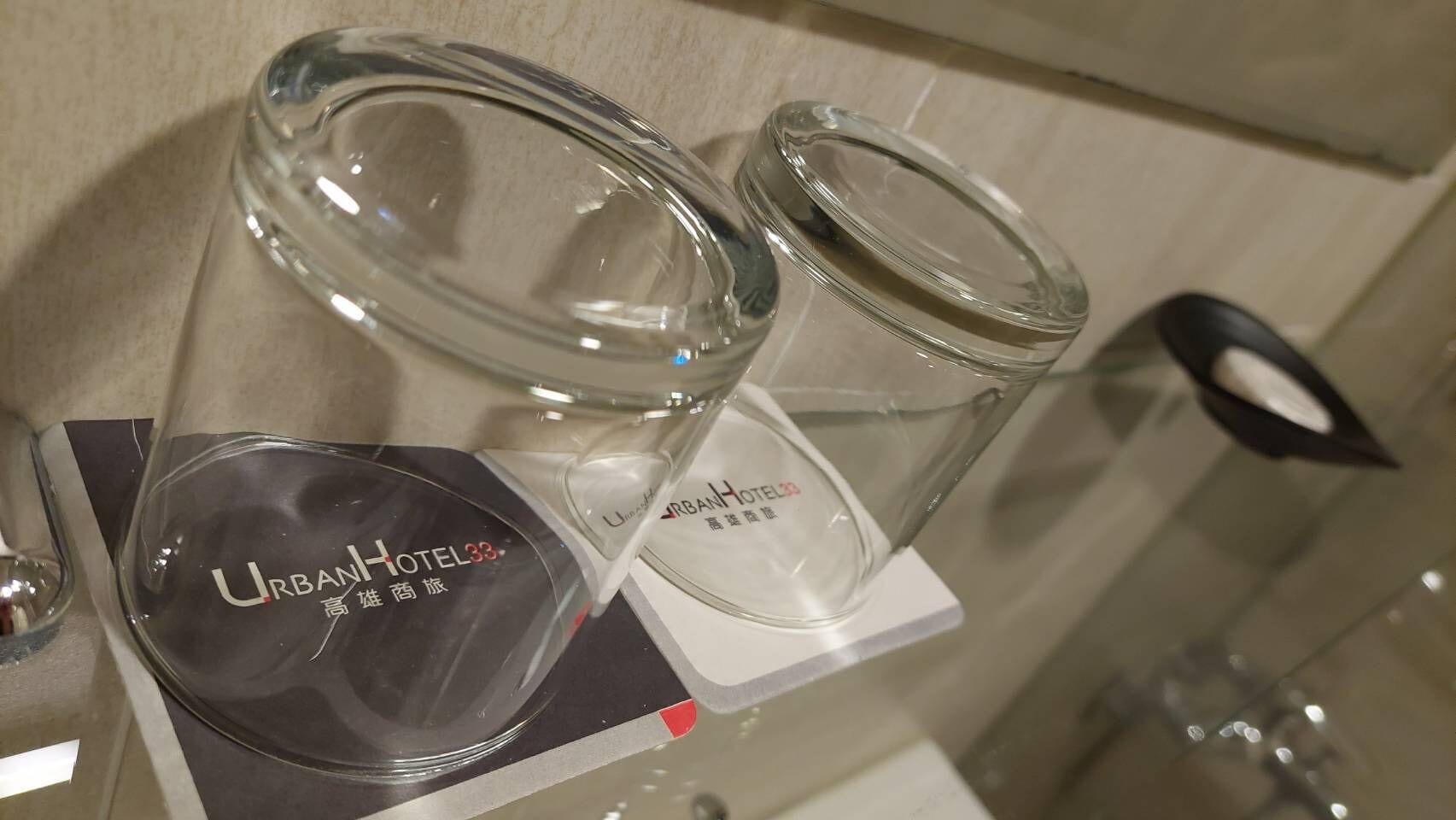 rainfall showerhead, hair dryer, slippers, towels