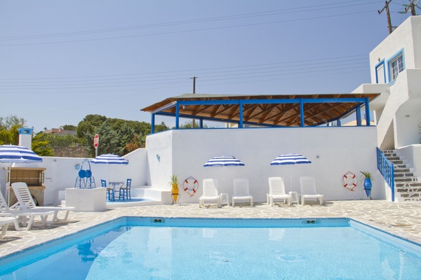 Seasonal outdoor pool, open 3:00 PM to 9:00 PM, pool umbrellas