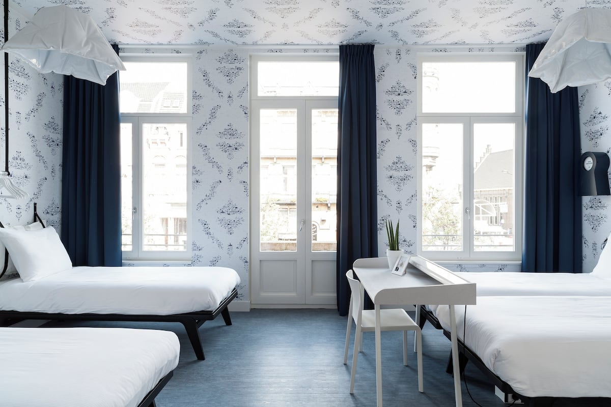 family quadruple room, multiple beds | premium bedding, in-room safe, desk, iron/ironing board