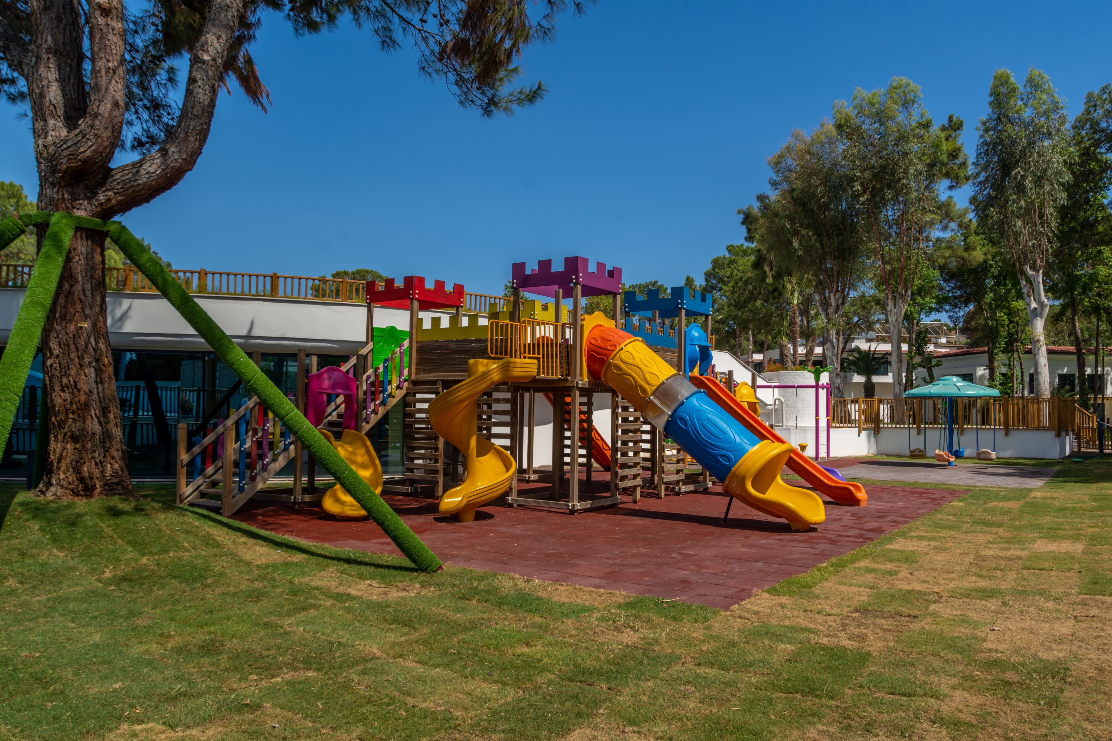 A playground with slides and climbing structures.