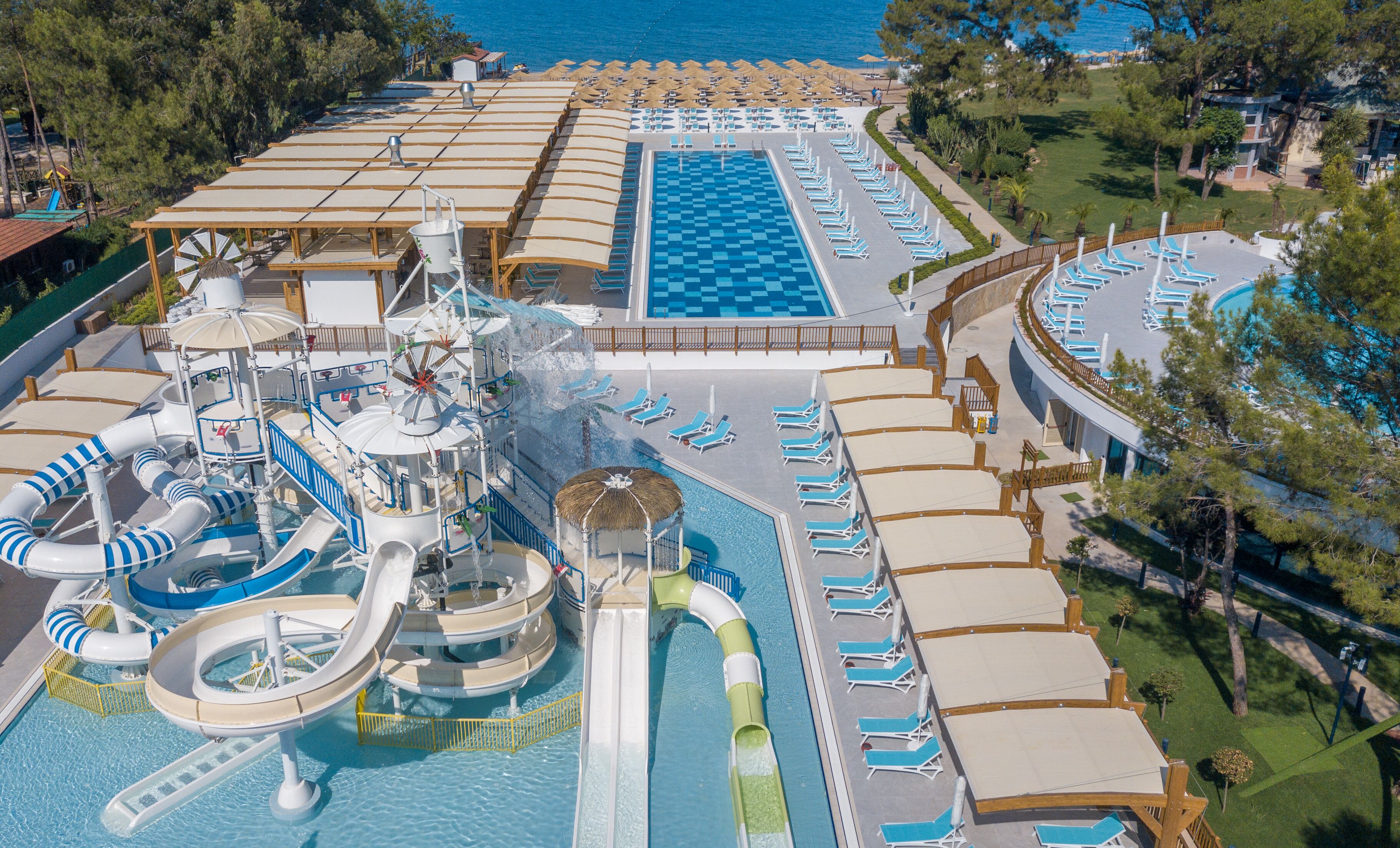 5 outdoor pools, pool umbrellas, pool loungers