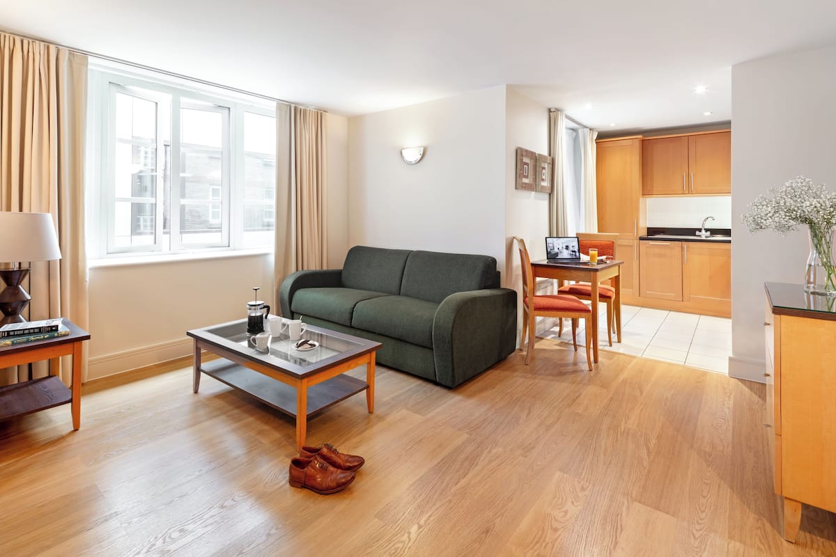 Desk, laptop workspace, iron/ironing board, cots/infant beds