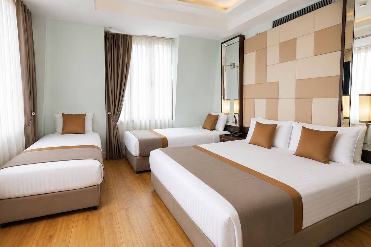 Family Quadruple Room, Sea View | Premium bedding, minibar, in-room safe, desk