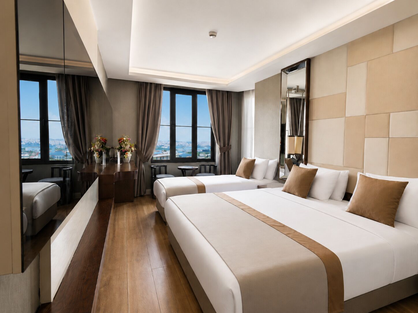 Deluxe Triple Room, Sea View | Premium bedding, minibar, in-room safe, desk