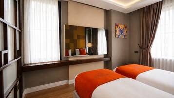 Ropa de cama de alta calidad y minibar